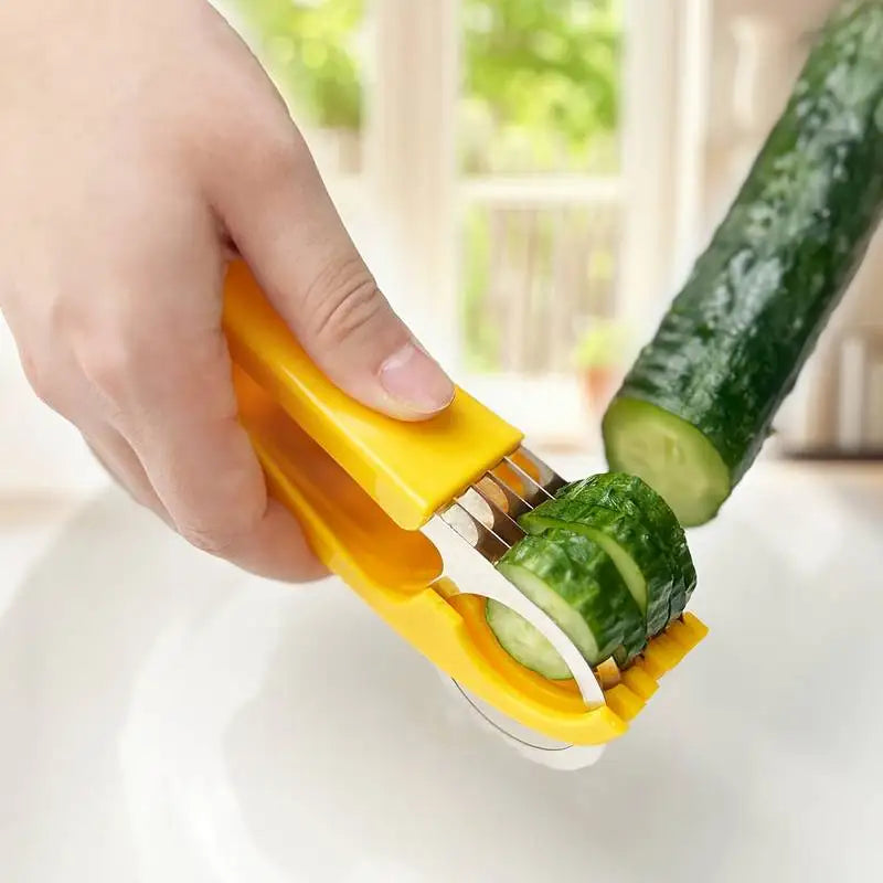 A hand is using a yellow manual vegetable slicer to cut a cucumber on a white plate.