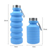 A set of two collapsible silicone water bottles in light blue with silver caps and clasps.
