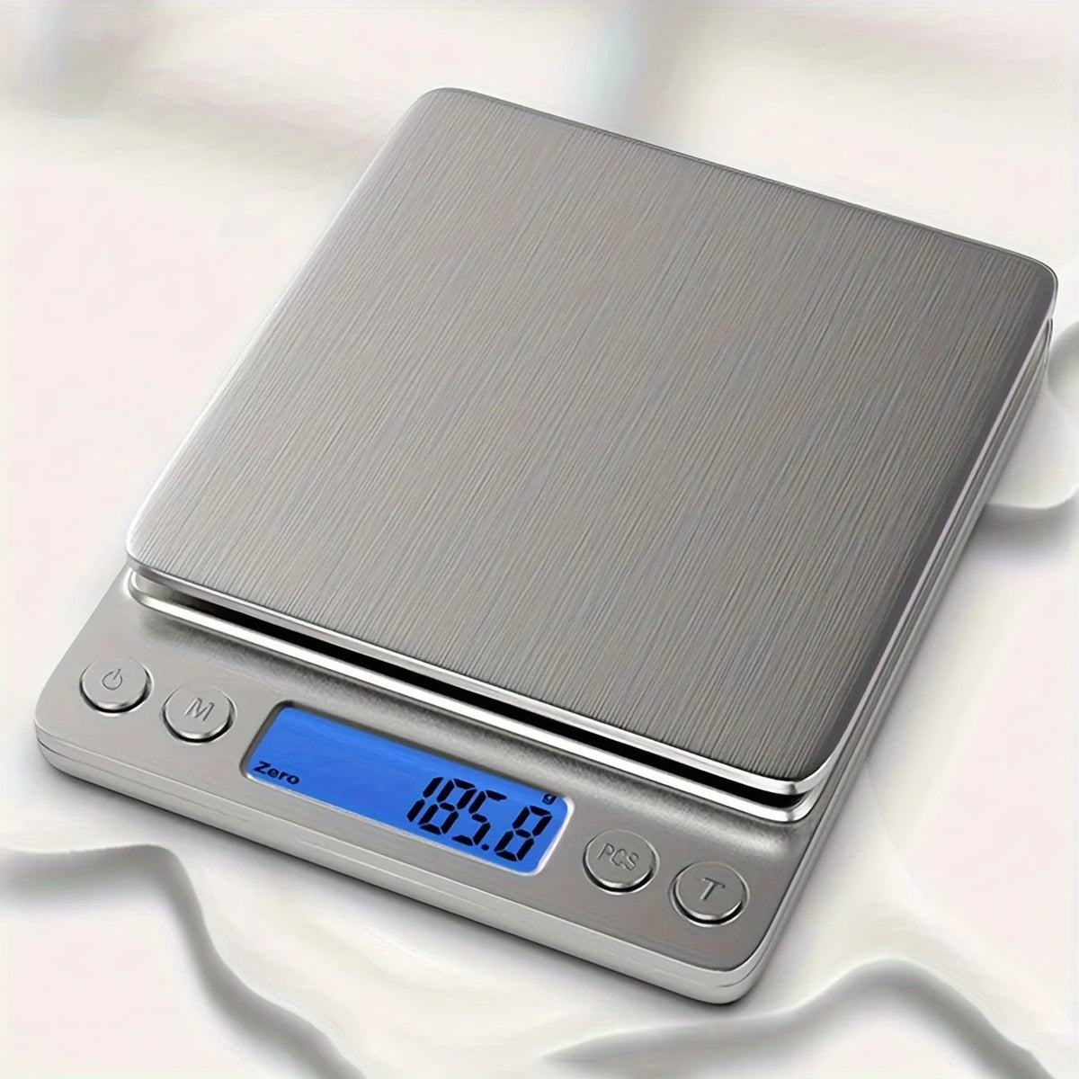 A silver digital kitchen scale displaying a weight of 105.8 grams.