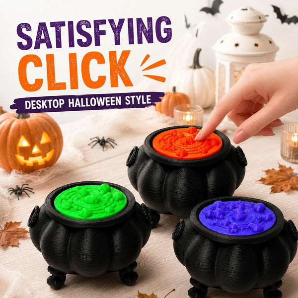 A collection of black witch cauldrons filled with brightly colored slime for a desktop Halloween style display.