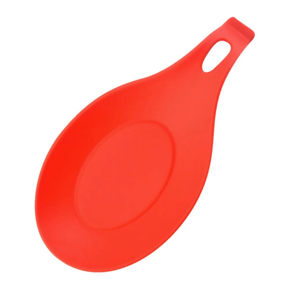 A bright red silicone kitchen utensil holder and organizer rack with a handle.