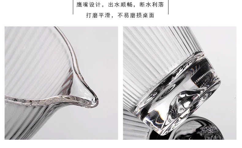 Close-up view of a clear borosilicate glass tea cup, showing the design for a spout and rim.