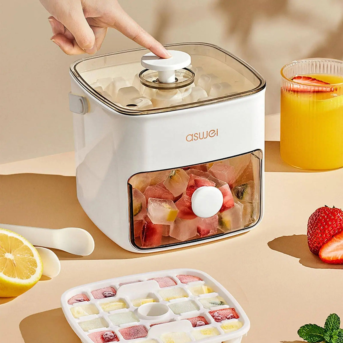 A white ice cube maker with a double layer design is shown next to fresh fruit and ice cubes.