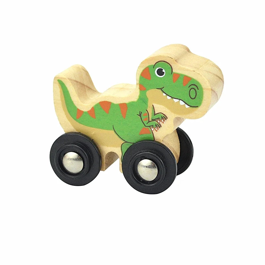 A wooden magnetic train car shaped like a green dinosaur with large wheels.