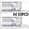 Ten reusable aluminum foil storage bags filled with various vegetables and fruits
