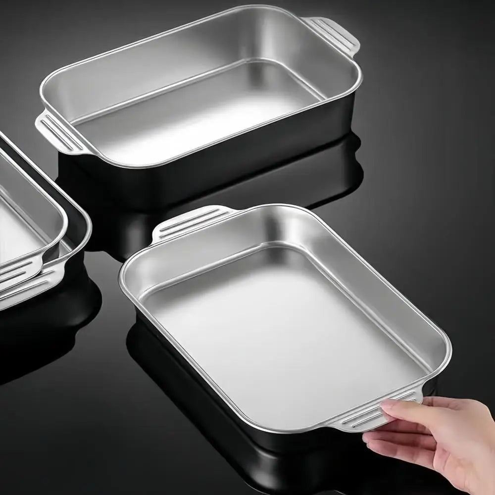 A set of two rectangular stainless steel baking pans with black bases shown from above.