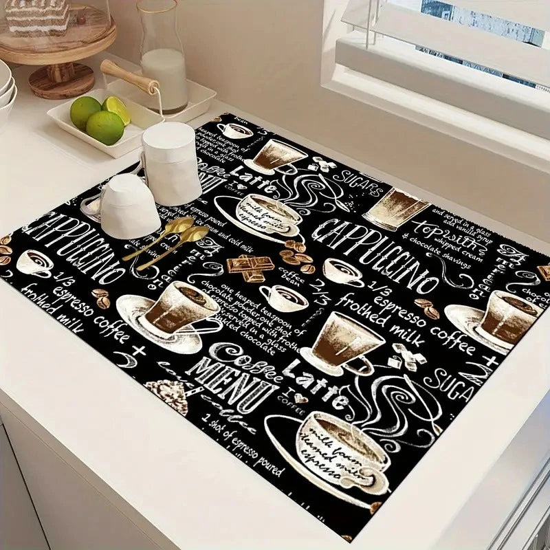 Black and white coffee themed print on a kitchen drying mat featuring various coffee and espresso elements