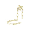 Gold-toned suspension wine rack with multiple hanging chains for home bar decor
