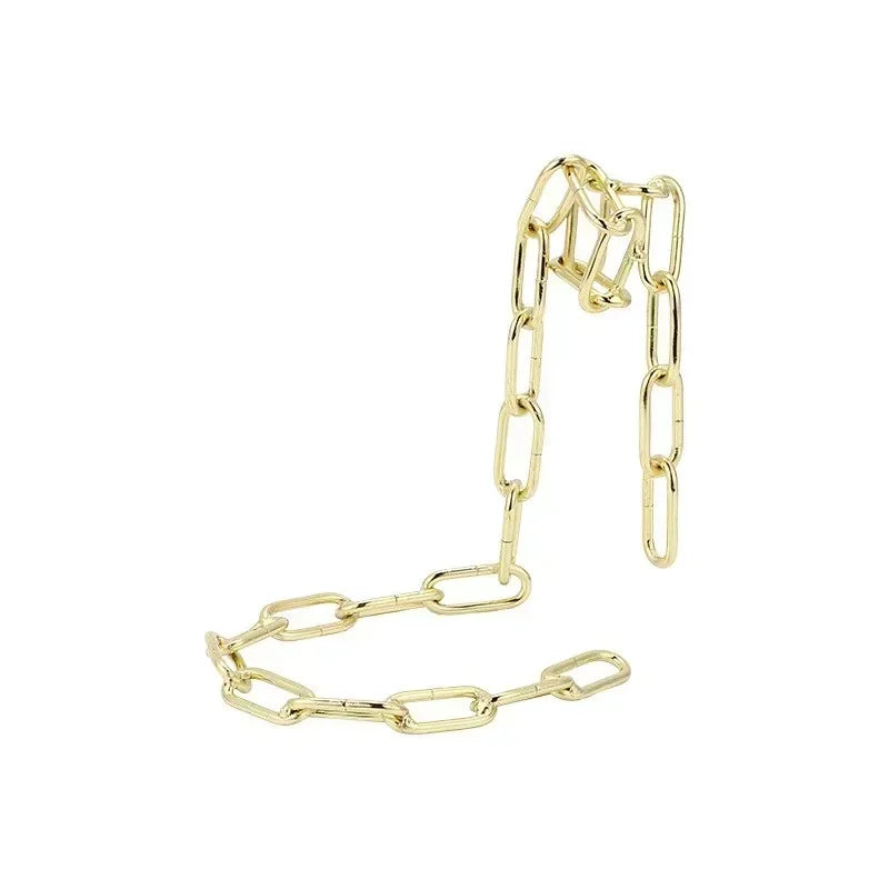 Gold-toned suspension wine rack with multiple hanging chains for home bar decor