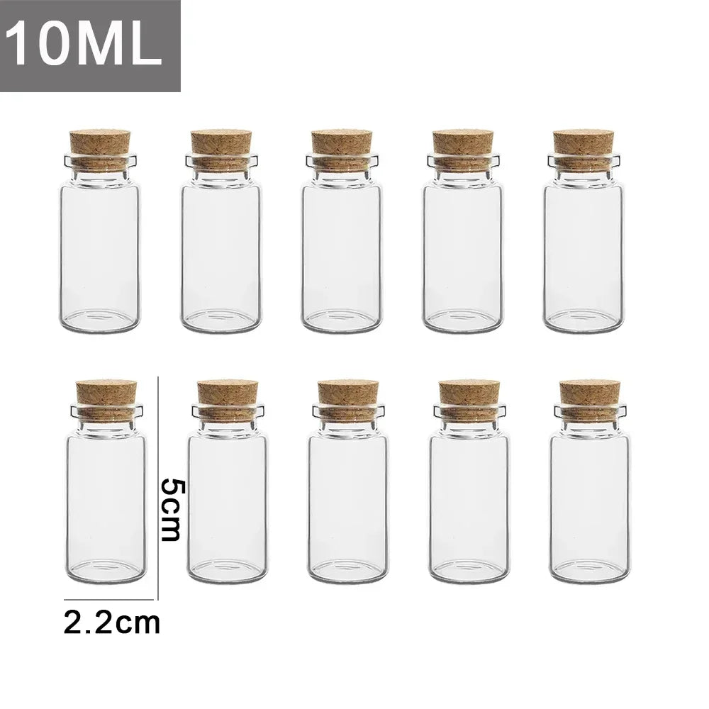 A set of clear glass bottles with cork stoppers, labeled as 10ML decorative message and wishing bottles.