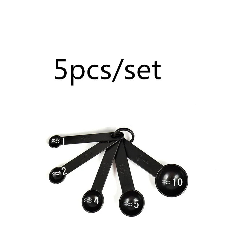 A set of five precision kitchen measuring tools, including a numbered set and a ten-piece set.