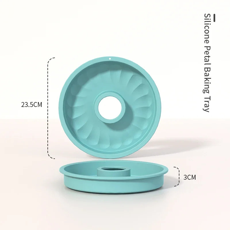 A light blue silicone petal baking tray with a removable insert and a small lid.