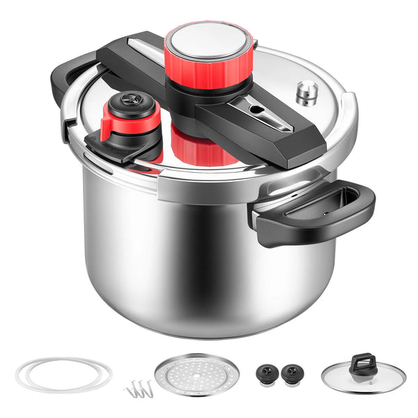 Stainless steel pressure cooker with a red and black lid, steaming rack, and various accessories.