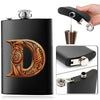 A black stainless steel flask water bottle featuring an embossed gold letter D design and a separate metal pourer.