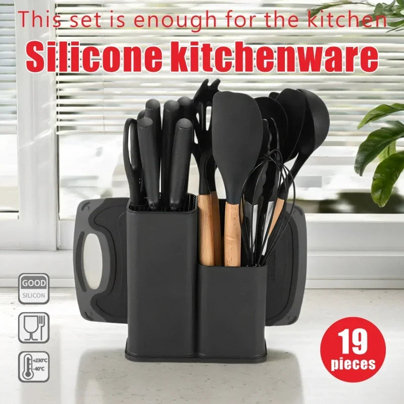 A set of 19 silicone kitchenware tools including knives and spatulas stored in a black holder.