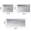 Stainless steel cake scraper and dough cutter with a measuring scale shown in various lengths.