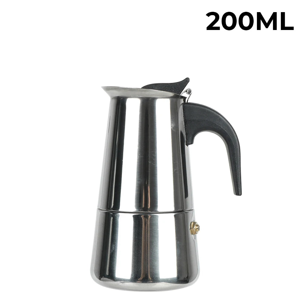 A silver Italian aluminum moka pot coffee maker with a handle and spout, shown against a white background.