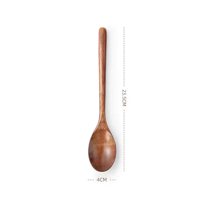 A single wooden spoon with a long handle, used for cooking and dining.