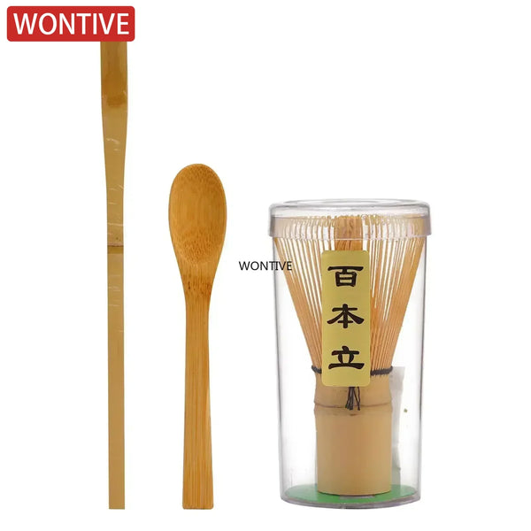 A set featuring a bamboo whisk and a glass container filled with bamboo tea straws for matcha tea.