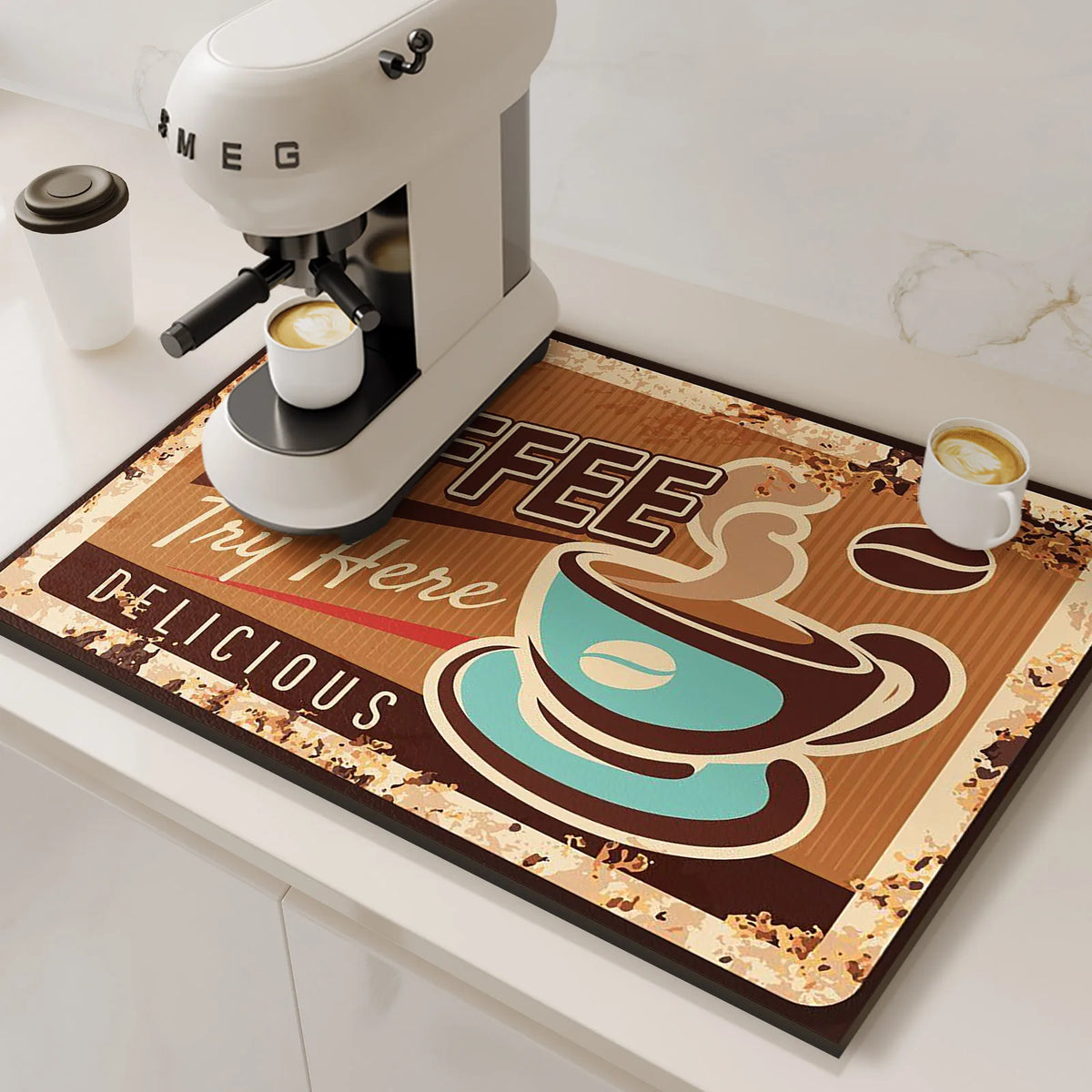 A reusable non-slip dish drying mat featuring a coffee theme with a coffee machine and latte cup design.