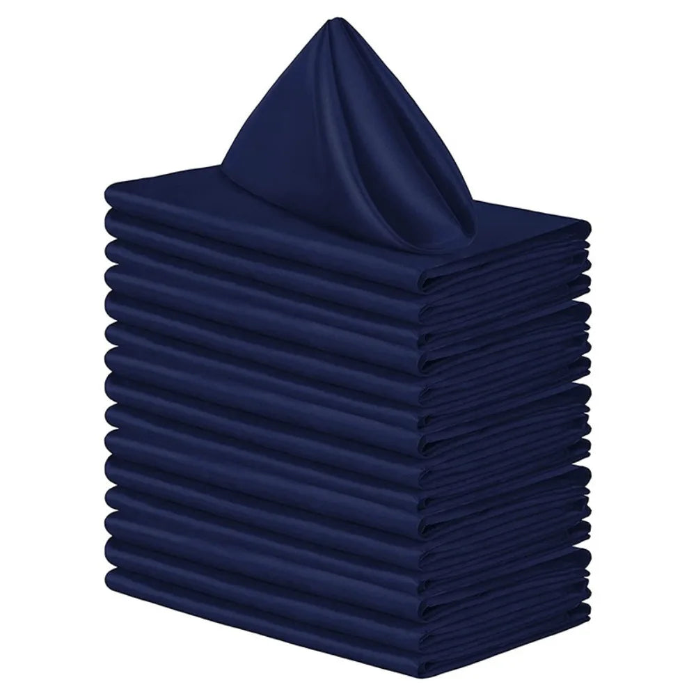 A stack of ten navy blue satin dinner napkins folded neatly.