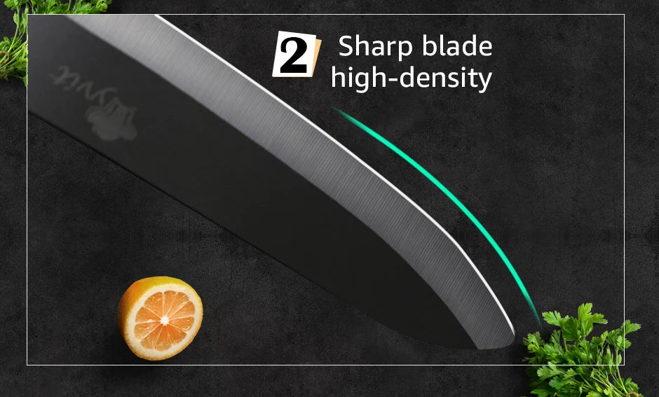 A black ceramic chef knife is shown with a sharp blade and a green accent, next to a slice of orange and fresh herbs.