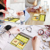 Hands are using a precision digital jewelry scale to measure small pieces of jewelry.