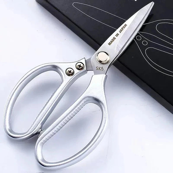 Silver stainless steel multi-function kitchen scissors with a handle and blade, labeled SK5.