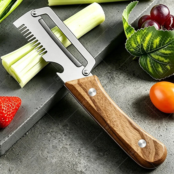 A silver multi-function peeler with a bottle opener and wooden handle resting on a gray surface with vegetables.