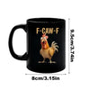 A black ceramic mug featuring a cartoon chicken with an open mouth and red comb.