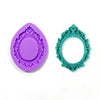 A purple silicone cake decoration mold set showing a disc and a circular wreath mold.