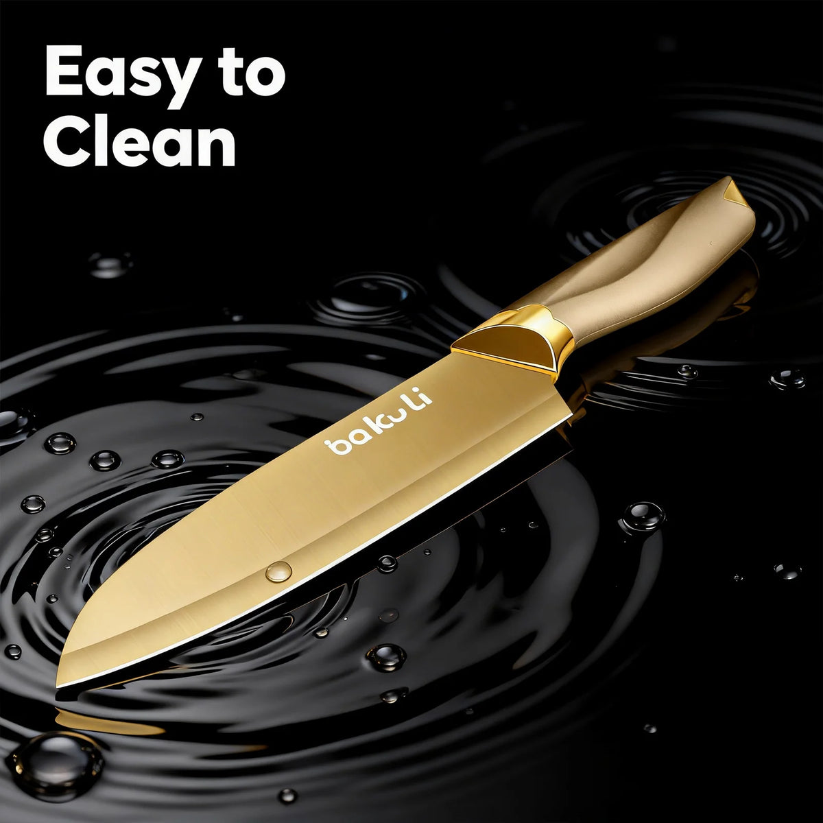 A gold-colored titanium knife blade and handle resting on water droplets.