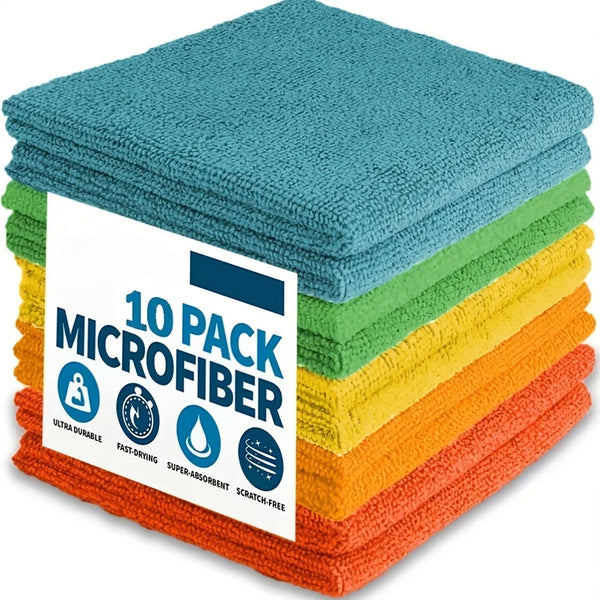 Stapel von drei türkisen Mikrofasertüchern mit weißer Etikett, das Merkmale wie ultrahochhaltbar und schnelltrocknend beschre