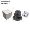 A kit containing a skull smoker, ice cubes, and a box for a 4-flavor cocktail smoking experience.