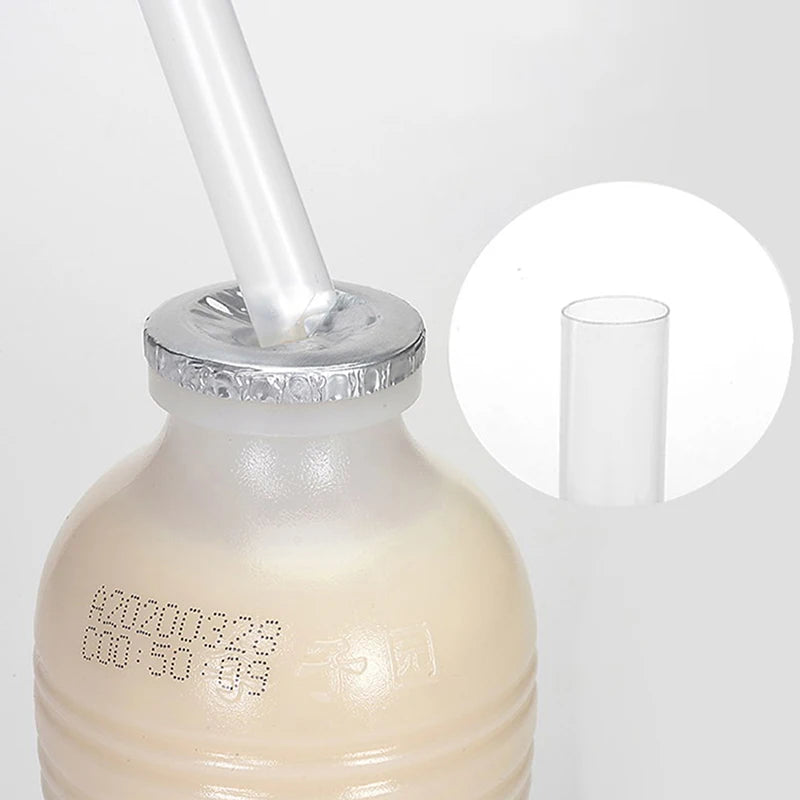 A clear plastic drinking straw is shown being inserted into a bottle, with an inset showing the straw itself.