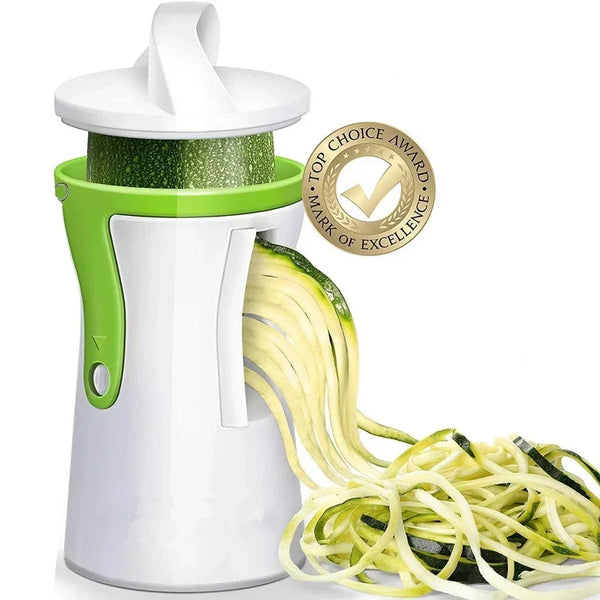 Weiße und grüne Küchenmaschine zum Zerkleinern von Gemüse, mit Zucchini-Nudeln und Auszeichnungssiegel.