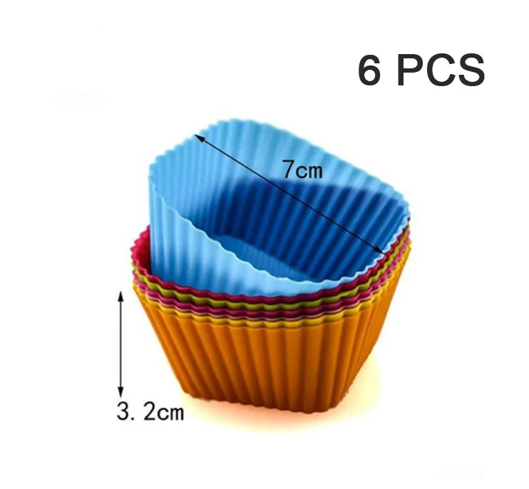 A set of six blue silicone muffin and cake baking molds stacked together.