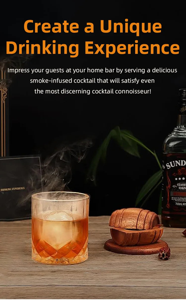 A glass of amber cocktail is shown next to a wooden whiskey flavor infuser kit with wood chips.