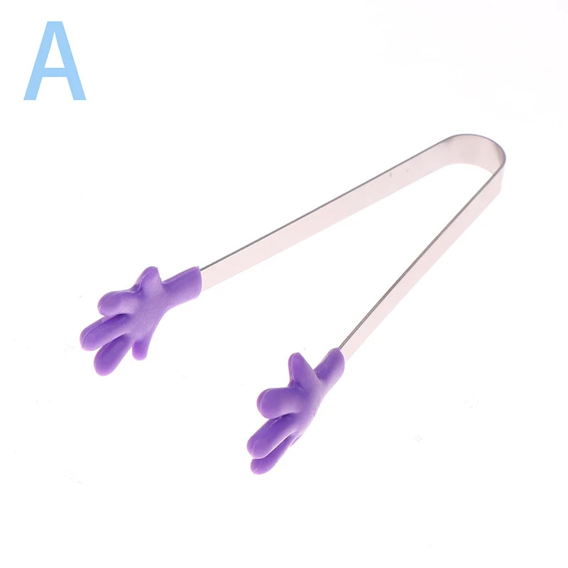 A pair of purple silicone palm food tongs used for BBQ and desserts.