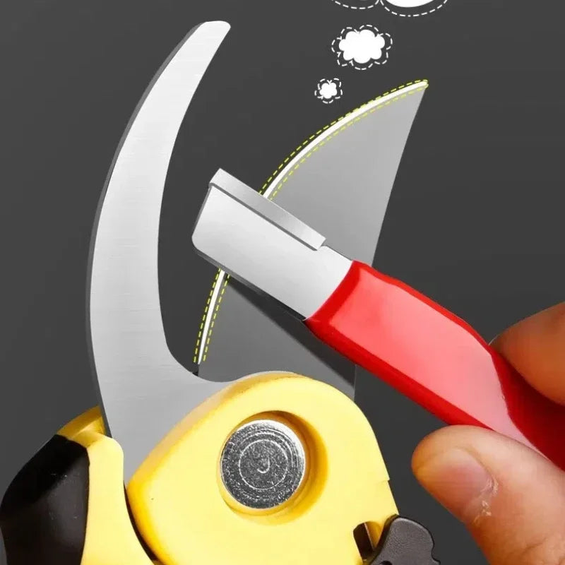 A hand holds a red knife sharpening tool with a silver blade, demonstrating the process of ceramic knife sharpening.