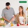 A man and a woman prepare vegetables using a heavy duty vegetable spiralizer for noodles.