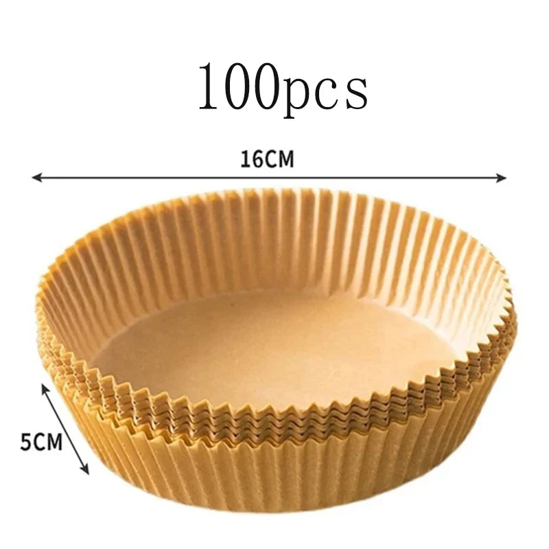 A round, light brown disposable non-stick baking mat with a 16cm diameter and 5cm depth.