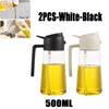 Two 500ml white and black dual-function kitchen oil spray bottles shown with liquid inside.