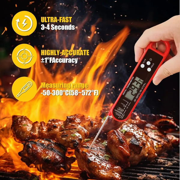 A hand holds an instant read digital meat thermometer measuring grilled meat over a fire.