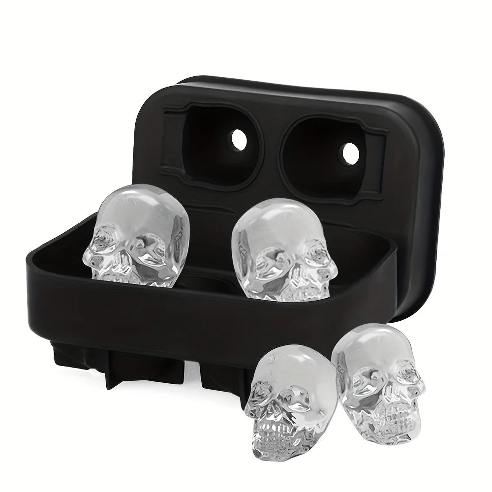 Black silicone skull ice cube molds for cocktails displayed in an open holder.