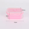 Contenedor de almacenamiento de silicona rosa plegable, 9.5 cm de alto y 13 cm de largo.