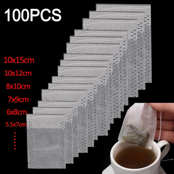 A stack of 100 disposable non-woven tea filter bags in various sizes is shown next to a cup of tea.