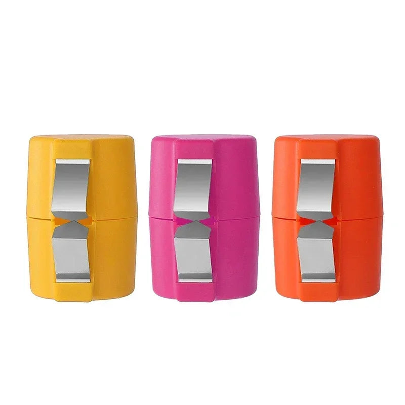 A set of three portable egg shell openers in yellow, pink, and orange.