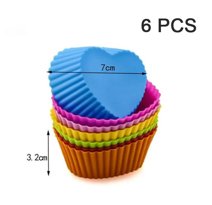 A set of six blue silicone muffin and cake baking molds stacked together.