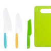 A set of plastic fruit and cake cutting tools including knives and a green cutting board.
